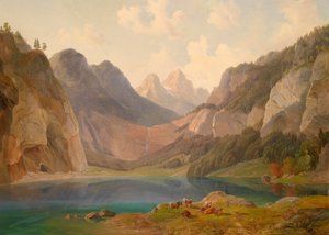 Paesaggio montano con gregge di animali a riposo in primo piano